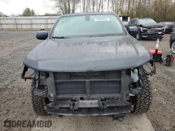 ✅ 2018 Chevrolet Colorado 4WD Z71 • VIN: 1GCGTDEN5J1168584 • Лот: 75629654. Опубликован ранее на Copart с пробегом 77 717 миль. Бесплатный доступ к архиву аукционных продаж из США и подробный отчёт об истории автомобиля на DreamBid. Изображение 4.