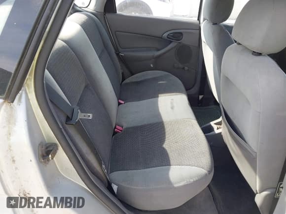 ✅ 2003 Ford Focus LX • VIN: 1FAFP33P23W102648 • Lot: 43191540. Wystawiony na IAAI z przebiegiem 191 481 mil. Bezpłatny archiwum sprzedaży aukcyjnych z USA i szczegółowy raport historii pojazdu na DreamBid. Zdjęcie 8.