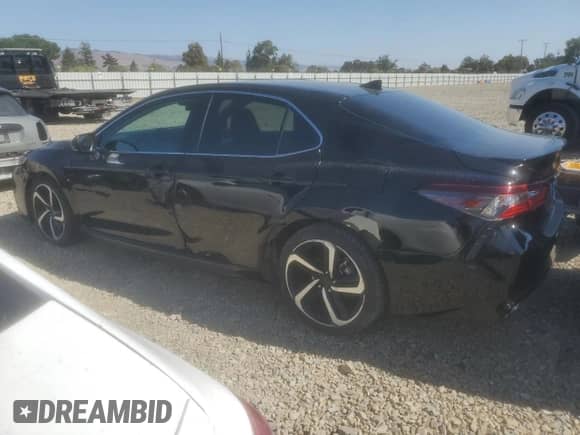 2022 Toyota Camry Hybrid SE with VIN 4T1G31AK8NU580993, listed as a Copart auction lot 81641015 with 138,818 mi miles and Salvage title. Bid and sale history available at DreamBid. Image 2.