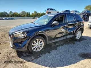 ✅ 2014 Mazda CX-5 Grand Touring • VIN: JM3KE2DY1E0364495 • Lot: 90520775. Listed on Copart with 93,156 mi. Free auction sales archive from the USA and detailed vehicle history report at DreamBid. Image 1.
