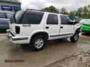 1999 Chevrolet Blazer LS z VIN 1GNDT13W9X2166733, wystawiony jako Copart lot #64965434 z przebiegiem 214 296 mil mil oraz Nie do naprawy • Non repairable. Historia ofert i sprzedaży dostępna na DreamBid. Obrazek 3.