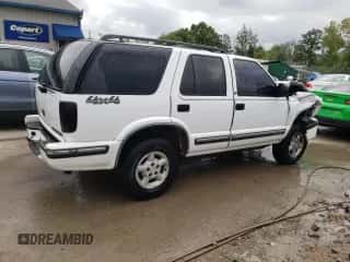 1999 Chevrolet Blazer LS z VIN 1GNDT13W9X2166733, wystawiony jako Copart lot #64965434 z przebiegiem 214 296 mil mil oraz Nie do naprawy • Non repairable. Historia ofert i sprzedaży dostępna na DreamBid. Obrazek 3.