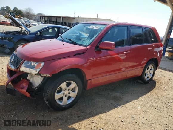 ✅ 2012 Suzuki Grand Vitara Premium • VIN: JS3TE0D62C4100130 • Lot: 48662145. Listed on Copart with 81,557 mi. Free auction sales archive from the USA and detailed vehicle history report at DreamBid. Image 1.