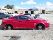 ✅ 2005 Hyundai Tiburon GS • VIN: KMHHM65D45U183100 • Лот: 43627934. Опубликован ранее на IAAI с пробегом 130 401 миль. Бесплатный доступ к архиву аукционных продаж из США и подробный отчёт об истории автомобиля на DreamBid. Изображение 13.