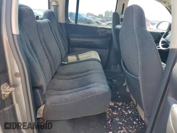 2002 Dodge Dakota SLT z VIN 1B7HL48X52S688636, wystawiony jako Copart lot #53062325 z przebiegiem 224 011 mil mil oraz Szkoda całkowita • Salvage title. Historia ofert i sprzedaży dostępna na DreamBid. Obrazek 10.