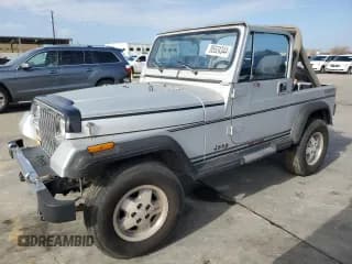 ✅ 1989 Jeep Wrangler • VIN: 2J4FY59T7KJ137127 • Lot: 85524344. Wystawiony na Copart z przebiegiem 150 929 mil. Bezpłatny archiwum sprzedaży aukcyjnych z USA i szczegółowy raport historii pojazdu na DreamBid. Zdjęcie 1.