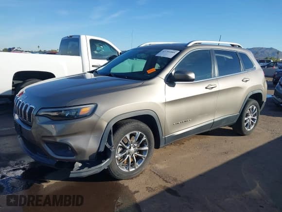 ✅ 2019 Jeep Cherokee Latitude Plus • VIN: 1C4PJLLBXKD382026 • Lot: 43791084. Listed on IAAI with 73,656 mi. Free auction sales archive from the USA and detailed vehicle history report at DreamBid. Image 2.