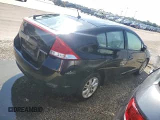 ✅ 2010 Honda Insight EX • VIN: JHMZE2H7XAS009962 • Лот: 73825084. Опубликован ранее на Copart с пробегом 120 513 миль. Бесплатный доступ к архиву аукционных продаж из США и подробный отчёт об истории автомобиля на DreamBid. Изображение 3.
