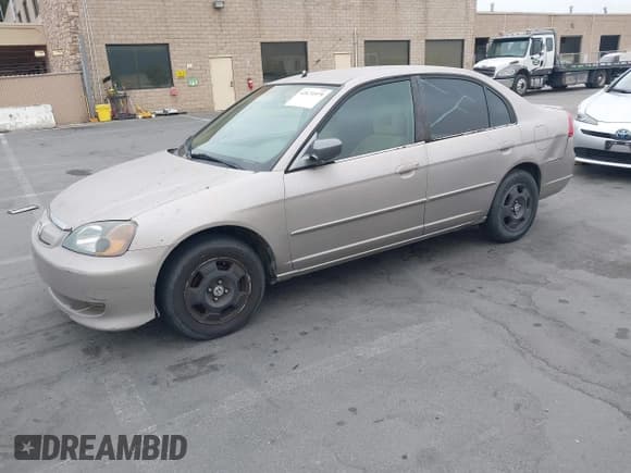 ✅ 2003 Honda Civic Hybrid • VIN: JHMES95693S020871 • Lot: 42671579. Listed on IAAI with 274,465 mi. Free auction sales archive from the USA and detailed vehicle history report at DreamBid. Image 2.