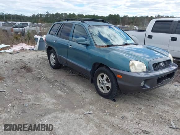 2002 Hyundai Santa Fe GLS with VIN KM8SC73D22U245851, listed as a IAAI auction lot 41733222 with 184,179 mi miles and . Bid and sale history available at DreamBid. Image 1.