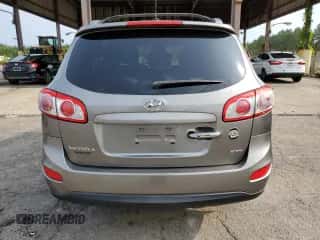 2012 Hyundai Santa Fe Limited с VIN 5XYZK3AB6CG166623, выставлен на аукционе Copart как лот 54138514 с пробегом 119 550 миль миль и Списание • Salvage title. История ставок и продаж доступна на DreamBid. Изображение 6.