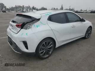2020 Hyundai Veloster 2.0 с VIN KMHTG6AF6LU027629, выставлен на аукционе Copart как лот 76408204 с пробегом 74 849 миль миль и Списание • Salvage title. История ставок и продаж доступна на DreamBid. Изображение 3.