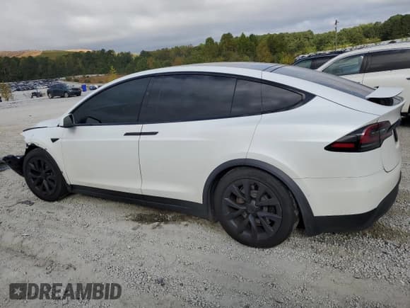 ✅ 2022 Tesla Model X Plaid • VIN: 7SAXCBE68NF360305 • Лот: 84538655. Опубликован ранее на Copart с пробегом 32 828 миль. Бесплатный доступ к архиву аукционных продаж из США и подробный отчёт об истории автомобиля на DreamBid. Изображение 2.