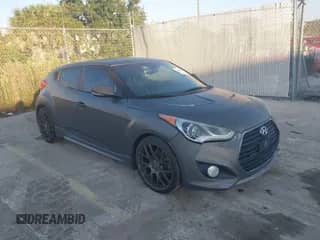 2014 Hyundai Veloster Turbo с VIN KMHTC6AE1EU210572, выставлен на аукционе IAAI как лот 43502526 с пробегом 147 530 миль миль и . История ставок и продаж доступна на DreamBid. Изображение 1.