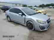 2015 Subaru Impreza Premium with VIN JF1GJAC65FH003011, listed as a Copart auction lot 68417355 with 193,467 mi miles and Salvage title. Bid and sale history available at DreamBid. Image 4.