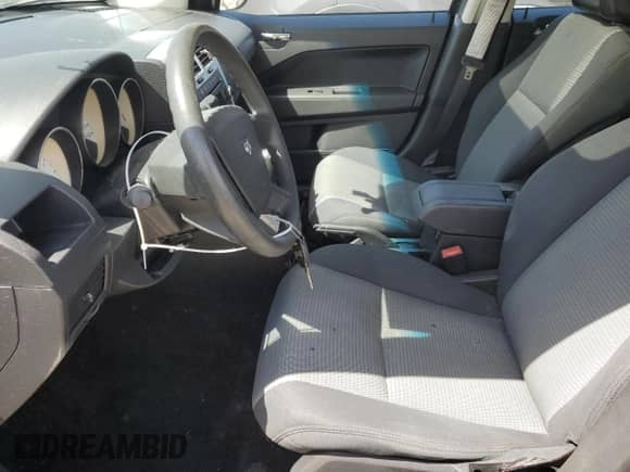 2009 Dodge Caliber SXT с VIN 1B3HB48AX9D209500, выставлен на аукционе Copart как лот 49409854 с пробегом 150 773 миль миль и Списание • Salvage title. История ставок и продаж доступна на DreamBid. Изображение 7.