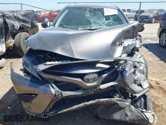 2019 Toyota Camry LE with VIN 4T1B11HK6KU729824, listed as a IAAI auction lot 43107969 with 157,176 mi miles and . Bid and sale history available at DreamBid. Image 6.