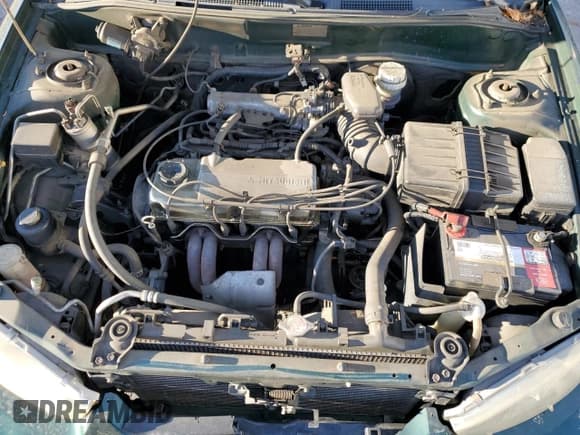 ✅ 2001 Mitsubishi Mirage DE • VIN: JA3AY11A91U015390 • Lot: 78753694. Listed on Copart with 133,504 mi. Free auction sales archive from the USA and detailed vehicle history report at DreamBid. Image 11.