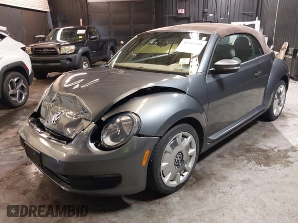 ✅ 2013 Volkswagen Beetle 2.5L • VIN: 3VW5P7AT1DM825757 • Lot: 41943380. Listed on IAAI with 46,967 mi. Free auction sales archive from the USA and detailed vehicle history report at DreamBid. Image 2.