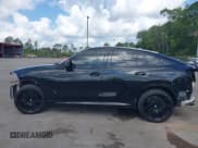 ✅ 2024 BMW X6 M • VIN: 5YM23ET07R9U83401 • Lot: 42180334. Listed on IAAI with 14,736 mi. Free auction sales archive from the USA and detailed vehicle history report at DreamBid. Image 15.