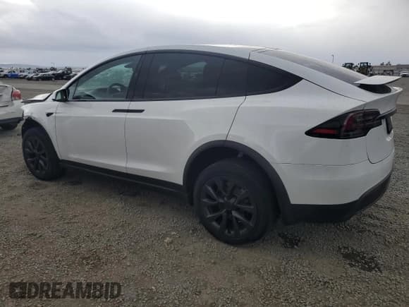 ✅ 2025 Tesla Model X • VIN: 7SAXCBE52SF468714 • Lot: 86094475. Wystawiony na Copart z przebiegiem 1 855 mil. Bezpłatny archiwum sprzedaży aukcyjnych z USA i szczegółowy raport historii pojazdu na DreamBid. Zdjęcie 2.