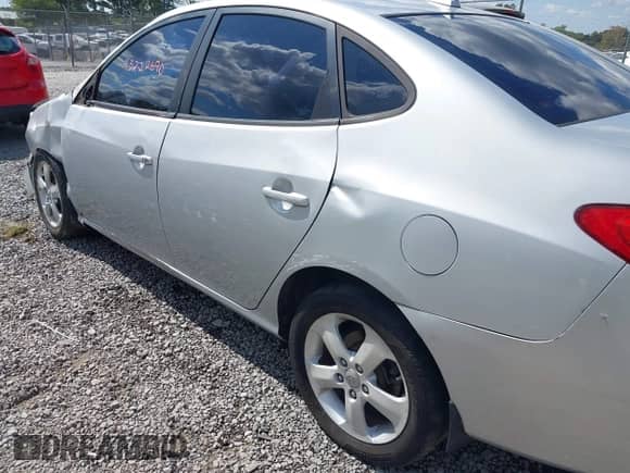 2010 Hyundai Elantra GLS z VIN KMHDU4AD4AU994821, wystawiony jako IAAI lot #43222690 z przebiegiem 91 647 mil mil oraz . Historia ofert i sprzedaży dostępna na DreamBid. Obrazek 13.