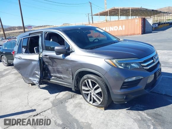✅ 2017 Honda Pilot EX-L • VIN: 5FNYF5H55HB017064 • Lot: 43348054. Listed on IAAI with 152,893 mi. Free auction sales archive from the USA and detailed vehicle history report at DreamBid. Image 1.