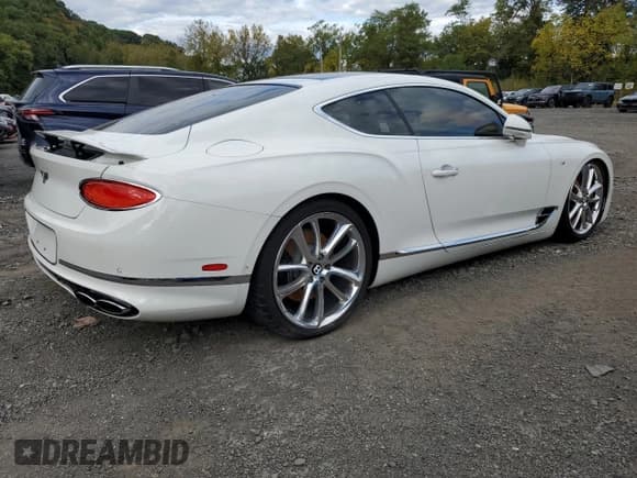 ✅ 2022 Bentley Continental GT GT V8 • VIN: SCBCG2ZG4NC096647 • Lot: 74068264. Listed on Copart with 14,666 mi. Free auction sales archive from the USA and detailed vehicle history report at DreamBid. Image 3.