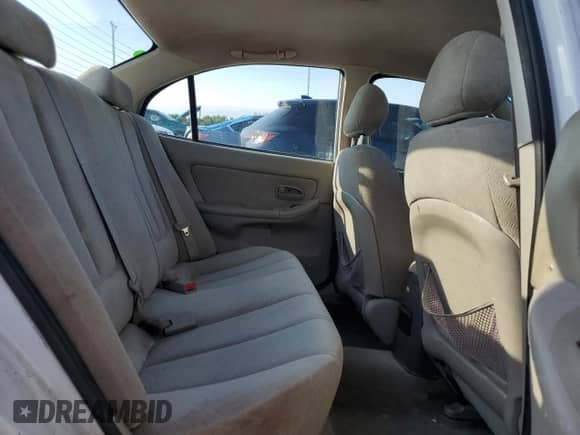2005 Hyundai Elantra GLS z VIN KMHDN46D75U123956, wystawiony jako Copart lot #67700514 z przebiegiem 236 789 mil mil oraz Szkoda całkowita • Salvage title. Historia ofert i sprzedaży dostępna na DreamBid. Obrazek 10.