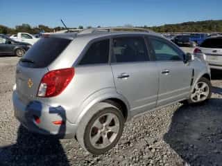 2014 Chevrolet Captiva Sport LT z VIN 3GNAL3EK0ES680819, wystawiony jako Copart lot #76615634 z przebiegiem 169 204 mil mil oraz Czysty tytuł • Clean title. Historia ofert i sprzedaży dostępna na DreamBid. Obrazek 3.