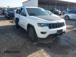 2021 Jeep Grand Cherokee Trailhawk with VIN 1C4RJFLG8MC829418, listed as a IAAI auction lot 41978730 with 61,674 mi miles and . Bid and sale history available at DreamBid. Image 1.