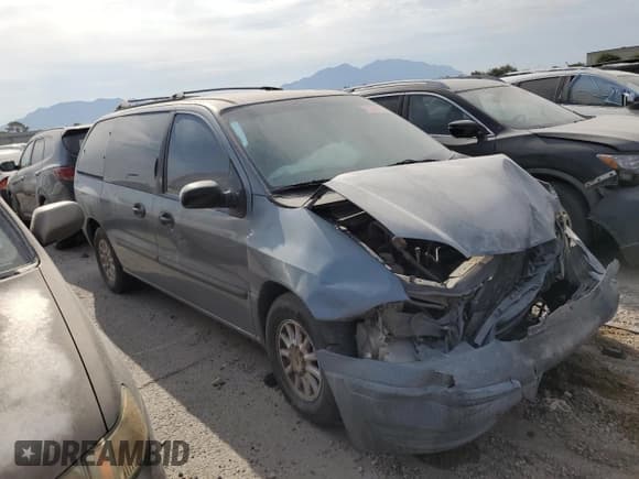 ✅ 1999 Ford Windstar LX • VIN: 2FMZA5145XBA21885 • Lot: 61294665. Listed on Copart with 186,452 mi. Free auction sales archive from the USA and detailed vehicle history report at DreamBid. Image 4.