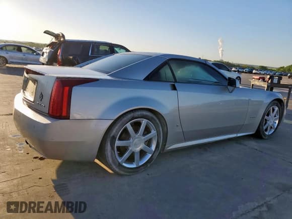 ✅ 2006 Cadillac XLR • VIN: 1G6YV36A465602551 • Lot: 54019215. Listed on Copart with 127,352 mi. Free auction sales archive from the USA and detailed vehicle history report at DreamBid. Image 3.