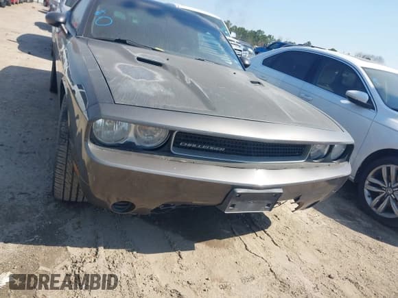 ✅ 2013 Dodge Challenger Rallye Redline • VIN: 2C3CDYAG7DH670128 • Lot: 41588960. Wystawiony na IAAI z przebiegiem 188 945 mil. Bezpłatny archiwum sprzedaży aukcyjnych z USA i szczegółowy raport historii pojazdu na DreamBid. Zdjęcie 6.