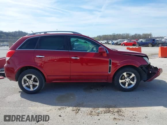 ✅ 2012 Chevrolet Captiva Sport LT • VIN: 3GNAL3E57CS613612 • Lot: 41851605. Wystawiony na IAAI z przebiegiem 288 773 mil. Bezpłatny archiwum sprzedaży aukcyjnych z USA i szczegółowy raport historii pojazdu na DreamBid. Zdjęcie 14.