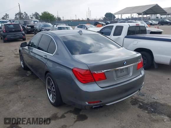 ✅ 2012 BMW 7 Series 740i • VIN: WBAKA4C52CC613676 • Lot: 42509312. Listed on IAAI with 113,971 mi. Free auction sales archive from the USA and detailed vehicle history report at DreamBid. Image 3.