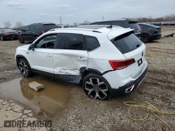 ✅ 2023 Volkswagen Taos SEL • VIN: 3VV2X7B29PM334788 • Lot: 51827675. Listed on Copart with 18,460 mi. Free auction sales archive from the USA and detailed vehicle history report at DreamBid. Image 2.