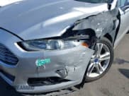 ✅ 2015 Ford Fusion Titanium • VIN: 3FA6P0SU3FR253429 • Lot: 43633823. Listed on IAAI with 132,695 mi. Free auction sales archive from the USA and detailed vehicle history report at DreamBid. Image 13.