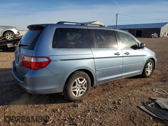 ✅ 2006 Honda Odyssey EX-L • VIN: 5FNRL38746B123750 • Лот: 90249165. Опубликован ранее на Copart с пробегом 264 175 миль. Бесплатный доступ к архиву аукционных продаж из США и подробный отчёт об истории автомобиля на DreamBid. Изображение 3.
