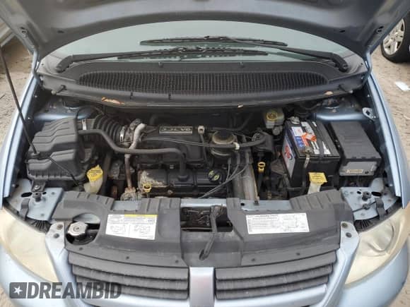 2005 Dodge Caravan SXT z VIN 1D4GP45RX5B134831, wystawiony jako Copart lot #76409394 z przebiegiem 105 167 mil mil oraz Nie do naprawy • Non repairable. Historia ofert i sprzedaży dostępna na DreamBid. Obrazek 12.