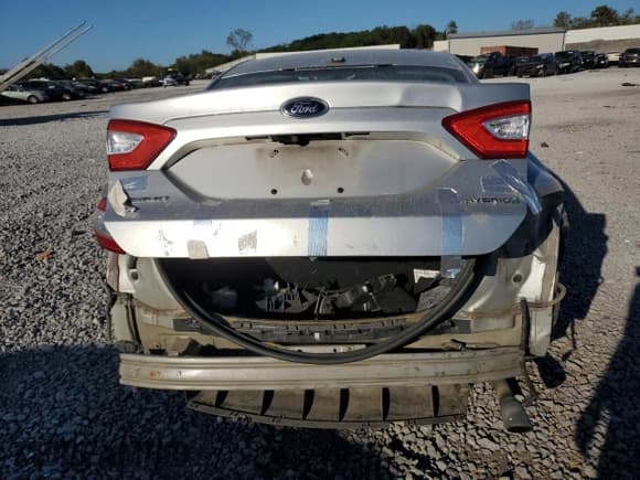 ✅ 2016 Ford Fusion S Hybrid • VIN: 3FA6P0UU5GR188114 • Lot: 87001665. Wystawiony na Copart z przebiegiem 162 112 mil. Bezpłatny archiwum sprzedaży aukcyjnych z USA i szczegółowy raport historii pojazdu na DreamBid. Zdjęcie 6.