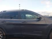 ✅ 2016 Jeep Cherokee Latitude • VIN: 1C4PJMCB4GW141886 • Lot: 41215064. Listed on IAAI with 122,794 mi. Free auction sales archive from the USA and detailed vehicle history report at DreamBid. Image 14.