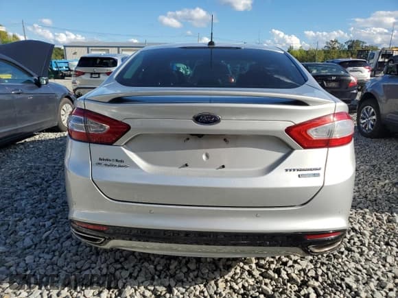 ✅ 2013 Ford Fusion Titanium • VIN: 3FA6P0D93DR137055 • Лот: 84436935. Опубликован ранее на Copart с пробегом 65 652 миль. Бесплатный доступ к архиву аукционных продаж из США и подробный отчёт об истории автомобиля на DreamBid. Изображение 6.