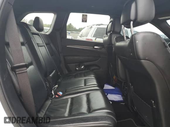 2021 Jeep Grand Cherokee 80th Anniversary z VIN 1C4RJFBG1MC810453, wystawiony jako Copart lot #81626215 z przebiegiem Nie podano mil oraz Szkoda całkowita • Salvage title. Historia ofert i sprzedaży dostępna na DreamBid. Obrazek 10.