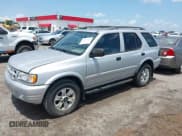 ✅ 2001 Isuzu Rodeo S • VIN: 4S2CK58W914357933 • Lot: 42427142. Listed on IAAI with 129,131 mi. Free auction sales archive from the USA and detailed vehicle history report at DreamBid. Image 2.