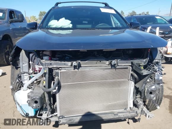 ✅ 2021 Toyota RAV4 Hybrid XSE • VIN: 4T3E6RFV1MU032243 • Lot: 43552146. Listed on IAAI with 51,854 mi. Free auction sales archive from the USA and detailed vehicle history report at DreamBid. Image 13.