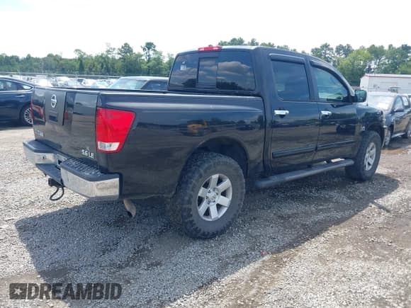 ✅ 2004 Nissan Titan LE • VIN: 1N6AA07B04N561832 • Lot: 42996175. Wystawiony na IAAI z przebiegiem 217 536 mil. Bezpłatny archiwum sprzedaży aukcyjnych z USA i szczegółowy raport historii pojazdu na DreamBid. Zdjęcie 4.