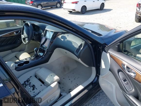 ✅ 2014 Infiniti Q50 Hybrid Premium • VIN: JN1AV7ARXEM702681 • Lot: 42602182. Listed on IAAI with 105,841 mi. Free auction sales archive from the USA and detailed vehicle history report at DreamBid. Image 5.