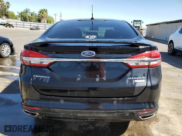 ✅ 2018 Ford Fusion Titanium • VIN: 3FA6P0K91JR146027 • Lot: 83468784. Wystawiony na Copart z przebiegiem 67 046 mil. Bezpłatny archiwum sprzedaży aukcyjnych z USA i szczegółowy raport historii pojazdu na DreamBid. Zdjęcie 6.