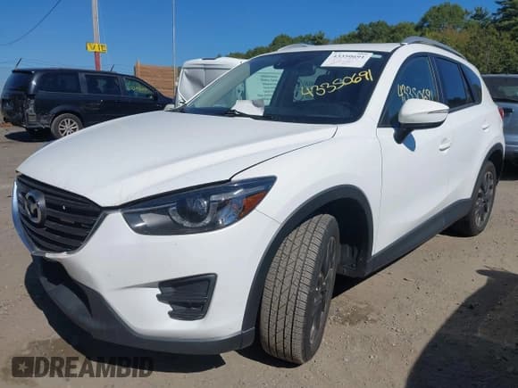 ✅ 2016 Mazda CX-5 Grand Touring • VIN: JM3KE4DY8G0908425 • Lot: 43350691. Wystawiony na IAAI z przebiegiem 144 684 mil. Bezpłatny archiwum sprzedaży aukcyjnych z USA i szczegółowy raport historii pojazdu na DreamBid. Zdjęcie 2.
